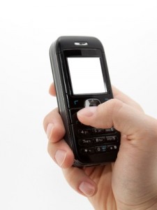 mobile phone in hand by sqback at stock.xchng